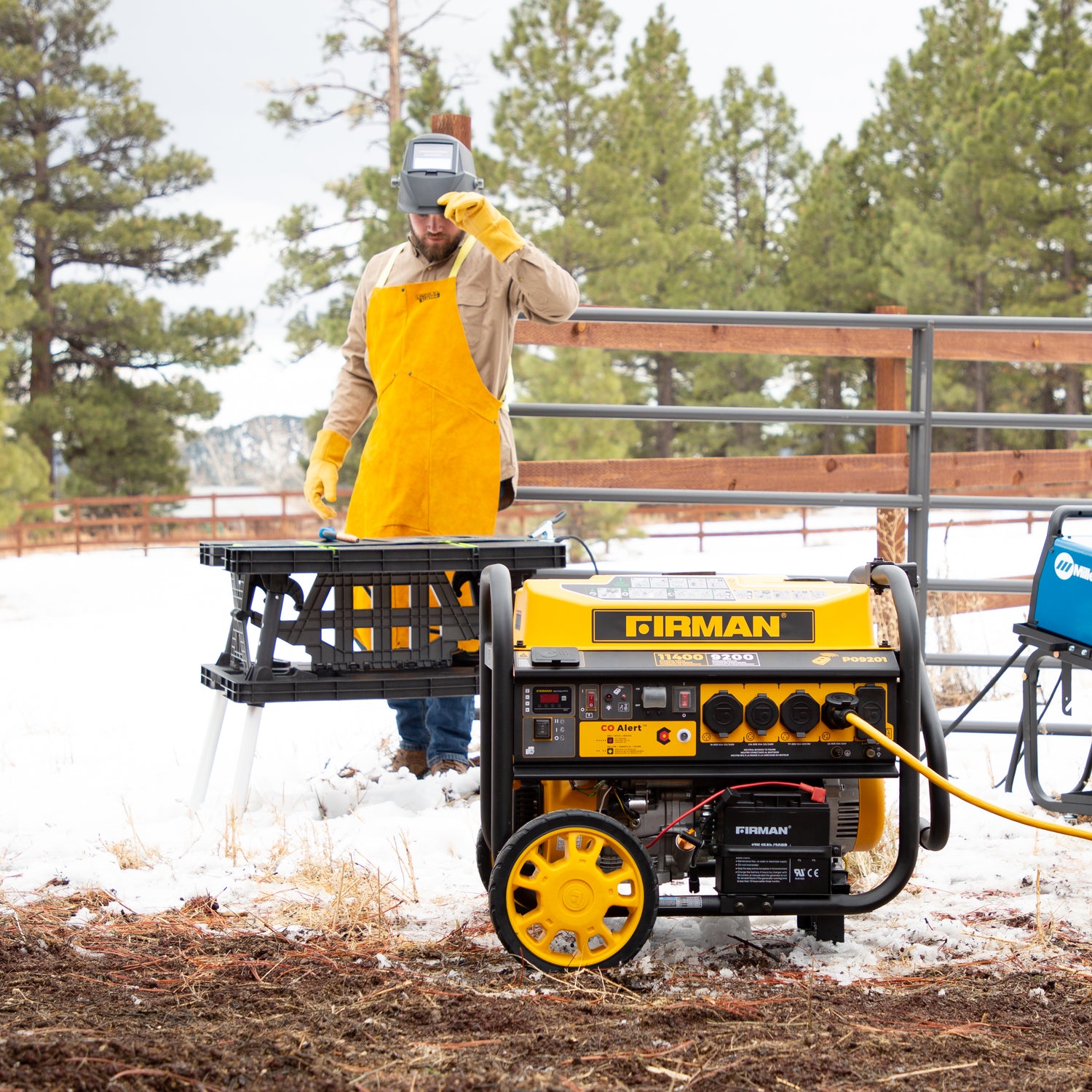 Firman Generator outside with guy getting ready to weld