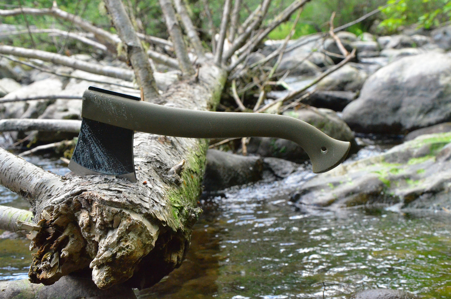 M-1-1991-CampingAxe-green-log-in-river.jpg